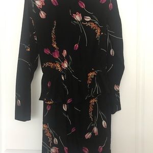 black dress whit flowers print.